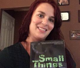 Anisha Tull Armontrout with her copy of Small Things Anisha Tull Armontrout with her copy of Small Things