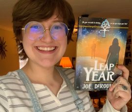 Hannah Hufffmaster-Bass with her brand new copy of Leap Year