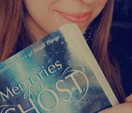 Kaci Churchill with her copy of Memories of a Ghost.