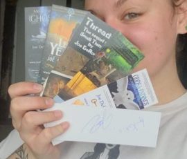 Katie Walker with her collection of bookmarks