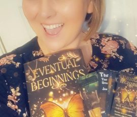 Kisha Padgett with her copy of Eventual Beginnings.