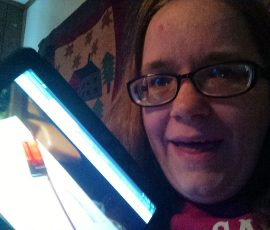 Sara Kinsella with a photo of her Small Things stick Sara Kinsella with a photo of her Small Things stick